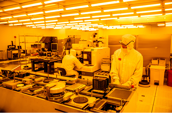 People working in a lab at ASU's MacroTechnology Works