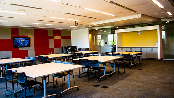 Another view of Global room close up of squares with monitor on wall.