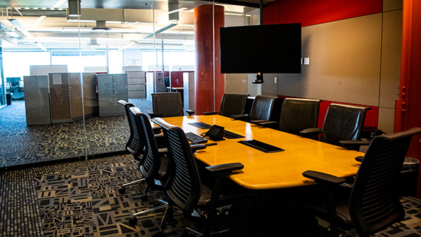 Endeavor boardroom view from hallway through glass doors