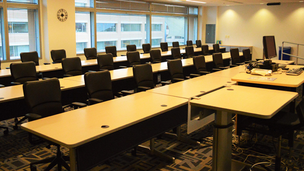 Exploration room set up classroom style with tales from front of room