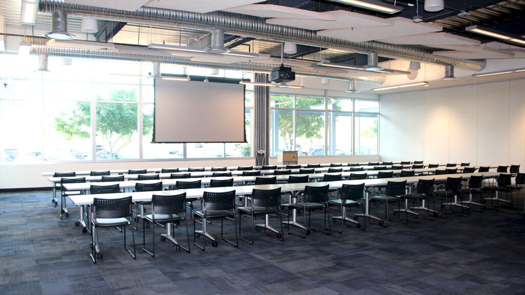 Synergy I set up classroom style from back of room facing windows