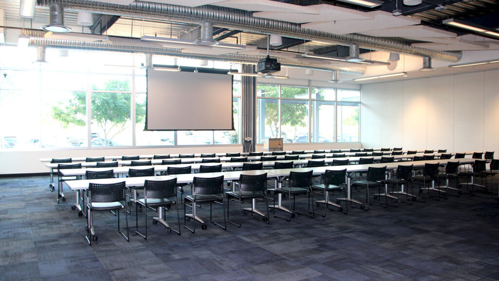 Synergy I set up classroom style from back of room facing windows