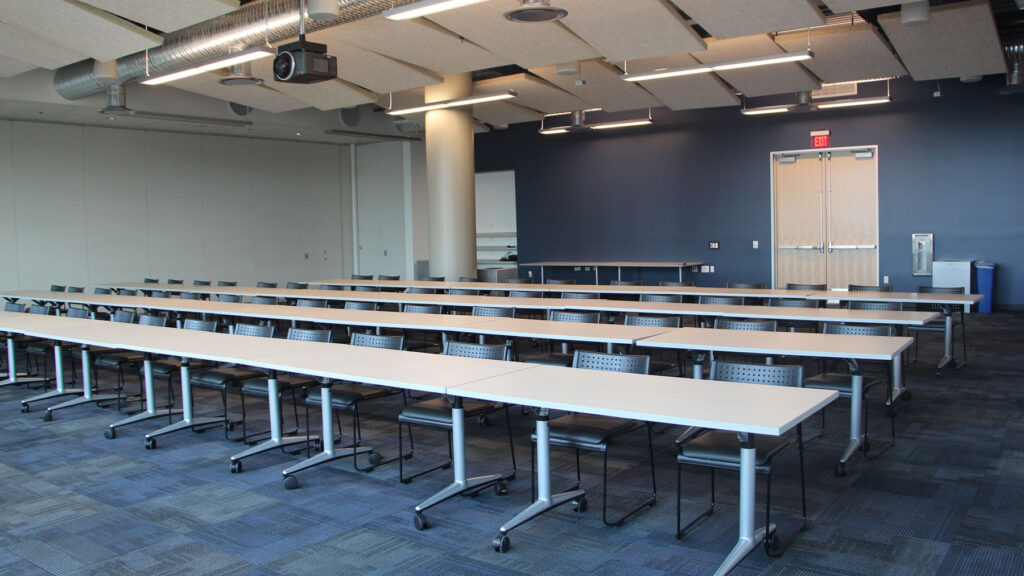 Synergy I set up with tables classroom style from front of room,